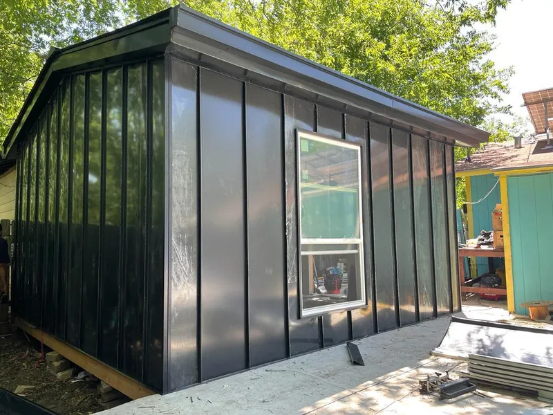 Black standing seam metal wall panels for Roof Inspection in North Union