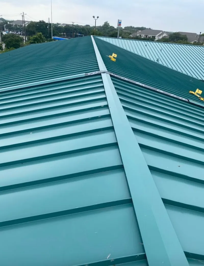 Green commercial metal roof ridge and valley for Metal Roof Repair in North Union