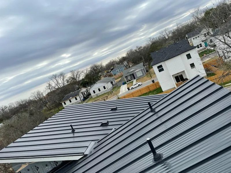 Standing seam metal roof panels with vents for Skylight Repair in North Union